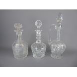 Three Antique Cut Glass Decanters and Stoppers, approx 27, 30 and 32 cms respectively. (3)