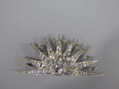 An Antique White Stone and Silver Crown and Star Brooch.