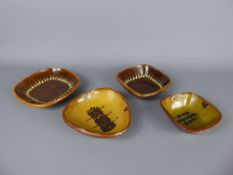 Four Dieter Kunzemann Cold Stone Glazed Pottery pin dishes, two brown and decorated with yellow,
