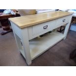 A Contemporary Cream Sideboard, with two short drawers and a lower shelf, approx 153 x 50 cms