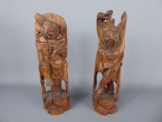 A Pair of Antique Chinese Carvings, approx 19 cms high.