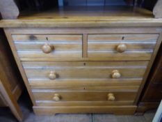 A Vintage Pine Chest of Drawers, having two short drawers and three long, with pine knob handles,