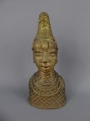 A West African Benin Study of a Woman, with decorative headdress and high collar, approx 25 cms.