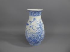 A Late 19th Century Japanese Blue & White Baluster Vase, hand painted with flowers and birds,