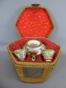A Late 19th Century Chinese Tea Basket, containing a Famille 'Rose Medallion' tea pot and cover