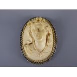An Antique Hand Carved Ivory Cameo set in a Silver Mount depicting a lady, cameo measures approx 6.5