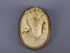 An Antique Hand Carved Ivory Cameo set in a Silver Mount depicting a lady, cameo measures approx 6.5