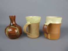 Three Winchcombe Pottery Stoneware items, including a part-glazed oatmeal and cream 1/2 pint beer