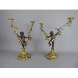 A Pair of Antique Bronze and Gilt Figural Candelabra, approx 43 cms.