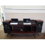 A Bang & Olufsen Beochord 6000, with with rosewood effect speakers and stand, together with a