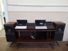 A Bang & Olufsen Beochord 6000, with with rosewood effect speakers and stand, together with a