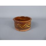 An Early (1930's) Winchcombe Pottery earthenware brown and yellow-decorated glazed ramekin dish (