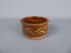 An Early (1930's) Winchcombe Pottery earthenware brown and yellow-decorated glazed ramekin dish (