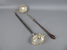 A Georgian Silver Ladle, London hallmark, mm Henry Herbert (?), dated 1749, with turned handle (af),