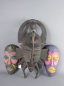 An Antique Hard-Wood Wooden African Mask with Crane on top, approx 40 cms together with three