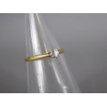 An 18ct Yellow Gold and Platinum Solitaire Diamond Ring, the dia approx 4.4 mm, size Q, approx 1.9