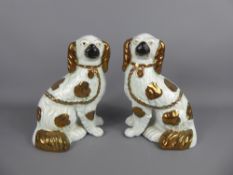 A Pair of Staffordshire Pottery Fireside Spaniels, approx 23 cms