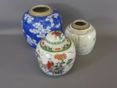 A Chinese Blue and White Ginger Jar Prunus design, together with a Famille Rose Ginger Jar and one