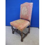 A Pair of Antique Mahogany Baronial Hall Chairs, with carved stretchers and feet, upholstered in