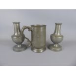 A Pair of Pewter Vessels approx 19 cms high, together with a glass bottomed pewter tankard, approx