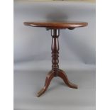 An Antique Oak Circular Occasional Table, on tripod base, approx 65 cms.