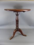 An Antique Oak Circular Occasional Table, on tripod base, approx 65 cms.