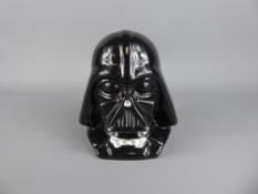 A Star Wars Black Darth Vader Ceramic Money Box, dated 1996.