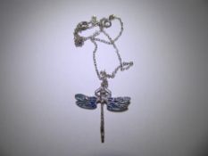 A Silver and Enamel Dragon Fly Pendant, on silver chain.