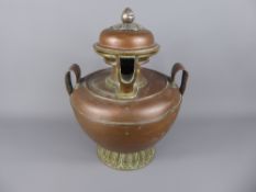 Tibetan Metalwork, Antique Copper Ewer with strap handles, silver finial on a lotus form base.