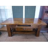 A Solid Oak Coffee Table with central drawer to front, approx 120 x 50 x 60 cms