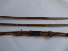 Two Antique Yew Wood Long Bows, approx 182 cms, both with hide grips together with a tribal