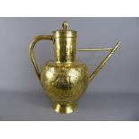 A 19th Century Dutch Brass Ewer, the lidded ewer depicting a repoussé Victorian coat of arms to