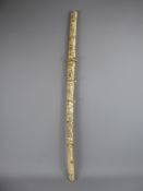 A 19th Century Japanese Sword, the scabbard carved with warrior figures, approx 86 cms.