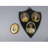 A Georgian Portrait Miniature Trio, in shield form frame, together with an antique portrait