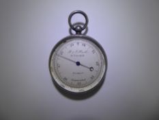 A Victorian Silver Cased Aneroid Pocket Barometer, signed R.J Beck Limited, engine turned rear cover