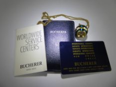 A Bucherer Pendant Watch on Chain. The watch with original box and papers.