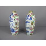 A Pair of Unusual Chinese Famille Rose Vases, the vases being decorated in two halves, blue and