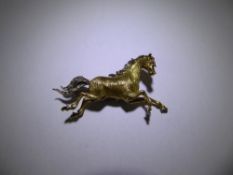 A Garrard & Co 18 ct Yellow White Gold and Diamond Stallion Brooch, approx 45 mm x 25 mm, approx