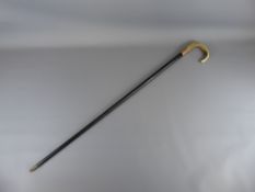 A Gentleman's Ebony and Horn Handled Walking Cane, with a 9 ct gold collar, Chester hallmark,