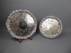 Two Silver Plated Card Trays, foliate decoration, on scroll feet.