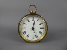 A French R & Co Brass Clock, enamel face with Roman dial, approx 14 cms.