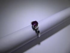 An 18 ct White Gold Pigeon Blood Ruby and Diamond Ring,