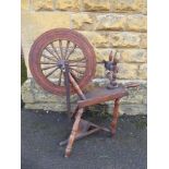 An Antique Spinning Wheel.
