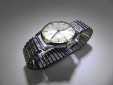 A Gentleman's Vintage Mechanical Stainless Steel Omega Wrist Watch. The watch on expanding