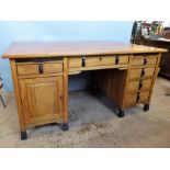 An Early 20th Century Gordon Russell English Walnut and Ebony Partners Desk, Design No 748, label to