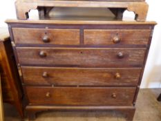 An Oak Chest of Drawers, with two short and three long graduated drawers, approx 94 x 49 x 88 cms.