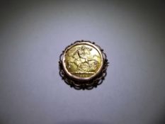 A Solid Gold George V Half Sovereign dated 1914 in 9 ct Gold Mount, approx 5.4 gms.