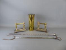 Two Brass and Metal Fireside "Dogs" with two fire implements together with a "trench art" brass