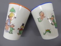 A Pair of Shelley Porcelain Beakers, one depicting children and a rhyme "On a fairy boat, to take us