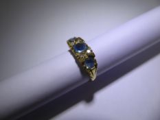 An Antique 18 ct Yellow Gold Aquamarine and Diamond Ring, size L, 1 x 5 mm aqua, 2 x 4mm aqua,